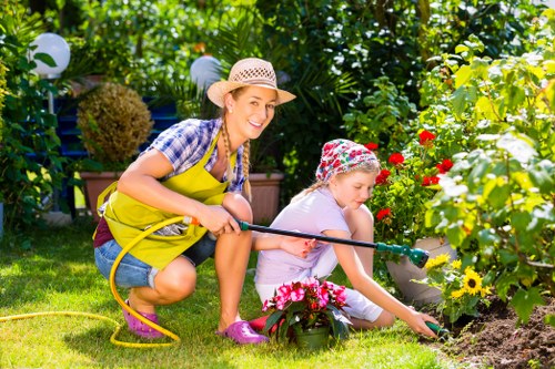 Residential garden soft landscaping in Sudbury with borders and lawn work